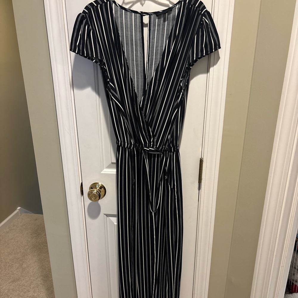 Be you be free black with off white stripes jumpsuit. Size S